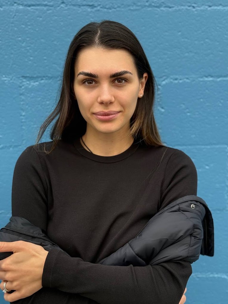 Coach Darina smiling on the ice rink